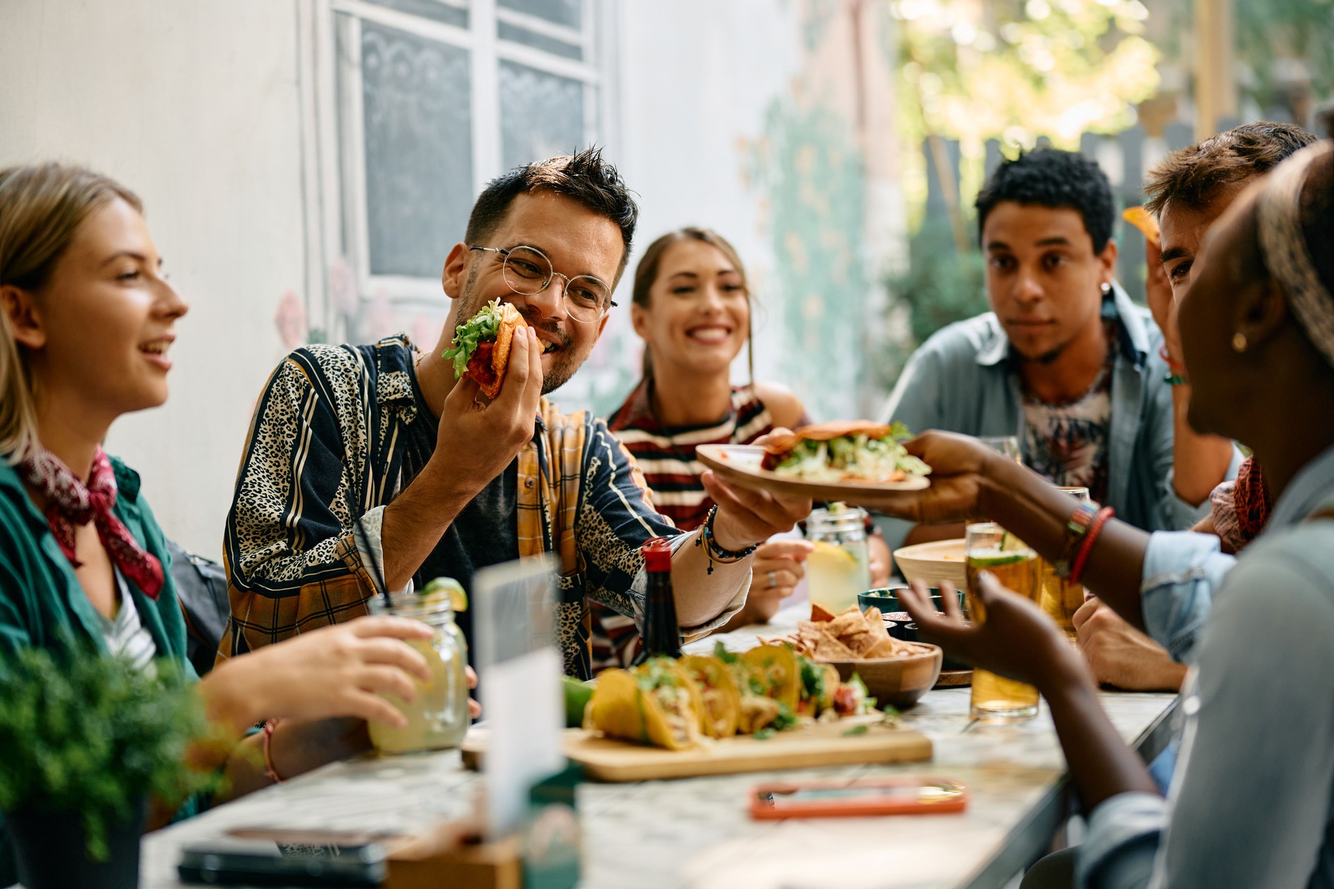 Here, try some, tacos are super tasty!